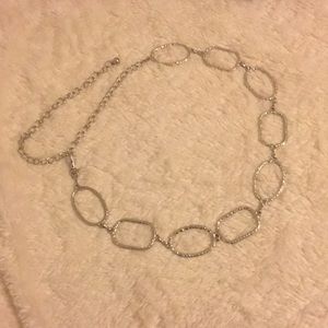 Silver oval loop chain belt. Adjustable size.